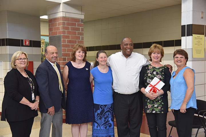 Principal congratulates retiring school staff